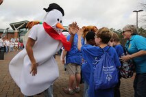 A snowman and a host of other holiday characters greet a group of Special Olympics athletes’ as they arrive at the Special Olympics. Marine Corps Air Station New River, in partnership with Special Olympics Onslow County hosted the 14th annual Special Olympics Fall Games at the AS-4400 fitness center, Dec. 6.
