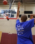 A Special Olympics athlete takes a shot from one of six different positions around the court, one of many games offered at this yea’s games. Marine Corps Air Station New River, in partnership with Special Olympics Onslow County hosted the 14th annual Special Olympics Fall Games at the AS-4400 fitness center, Dec. 6.
