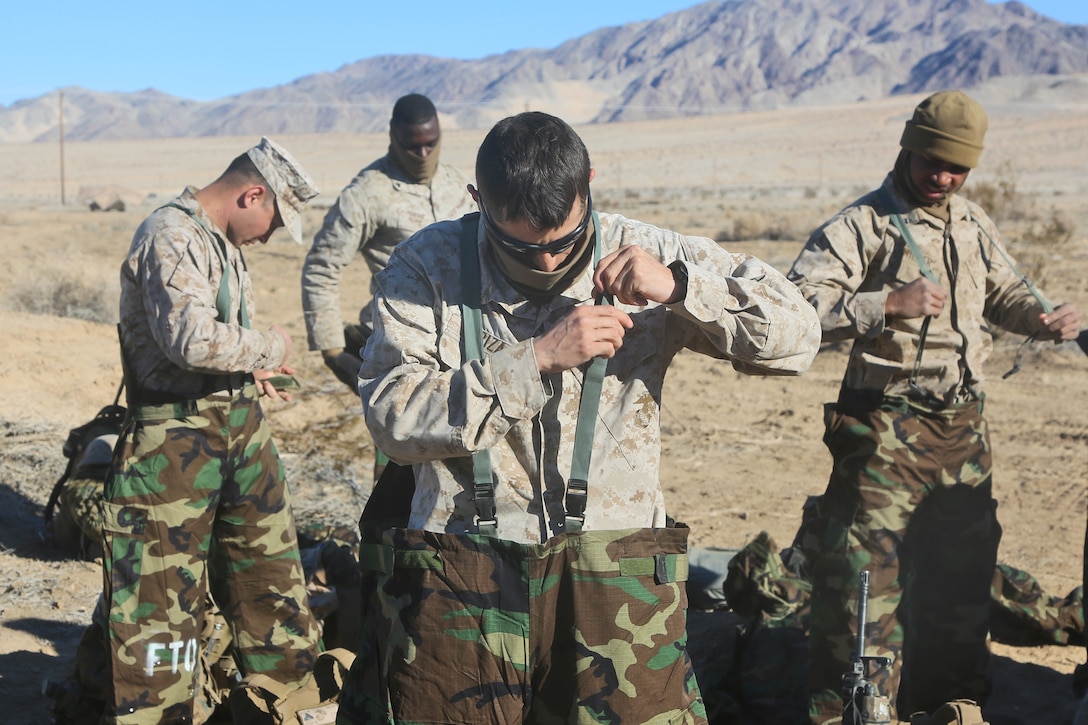 Marines with Combat Logistics Battalion 5, Combat Logistics Regiment 1, 1st Marine Logistics Group, train to react to Chemical, Biological, Radioactive and Nuclear scenarios during Exercise Steel Knight 2014 aboard Marine Corps Air Ground Combat Center, Twentynine Palms, Calif., Dec. 14, 2013. Approximately 240 Marines from CLB-5 supported multiple units throughout Twentynine Palms by providing them with supplies and logistical support. SK14, which took place Dec. 09-16, is an annual exercise designed to prepare the 1st Marine Division for deployment with the Marine Air Ground Task Force as the Ground Combat Element with the support of 1st MLG and 3rd Marine Air Wing. Combined, the MAGTF is able to deploy and respond in a timely manner to any situation across the globe.