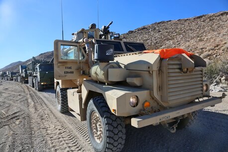 Private First Class Jordan Nash, a motor transport operator with Motor Transportation Company, Combat Logistics Battalion 5, Combat Logistics Regiment 1, 1st Marine Logistics Group, provides security during a convoy to deliver supplies to Marines with 11th Marine Regiment, 1st Marine Division, during Exercise Steel Knight 2014 aboard Marine Corps Air Ground Combat Center Twentynine Palms, Calif., Dec. 13, 2013. Multiple convoys from CLB-5 supplied food and fuel to various units throughout the expansive training. Exercise Steel Knight 2014, which took place Dec. 9-16, is an annual exercise designed to prepare the 1st Marine Division for deployment with the Marine Air Ground Task Force as the Ground Combat Element with the support of 1st MLG and 3rd Marine Air Wing. Combined, the MAGTF is able to deploy and respond in a timely manner to any situation across the globe.