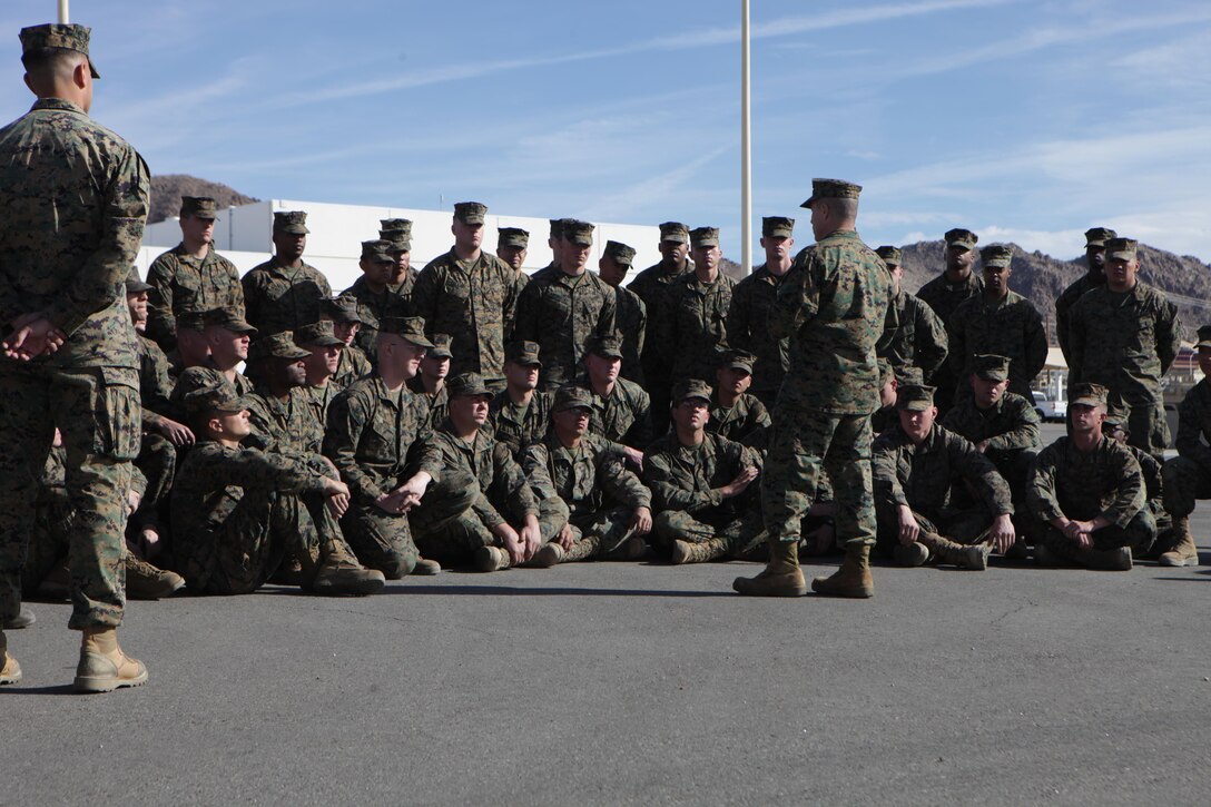 Col. Gregory Lemons, the commanding officer of Combat Logistics Regiment 45 talks with all the Marines participating in the training during his visit to the Marine Corps Air Ground Combat Center where Marines worked in the Enhanced Equipment Allowance Pool, Dec. 8-21, 2013.  This annual training allowed 4th MLG Marines to augment Exercise Support Division’s mission to repair equipment aboard the base. 