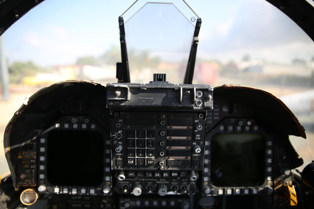 Visitors of The Flying Leatherneck Aviation Museum view the cockpit of an F/A-18 Hornet aboard Marine Corps Air Station Miramar, Calif., Nov. 17. The museum celebrated the F/A-18’s 35th anniversary of its first flight with the aircraft itself on display and models with information on the aircraft indoors.


