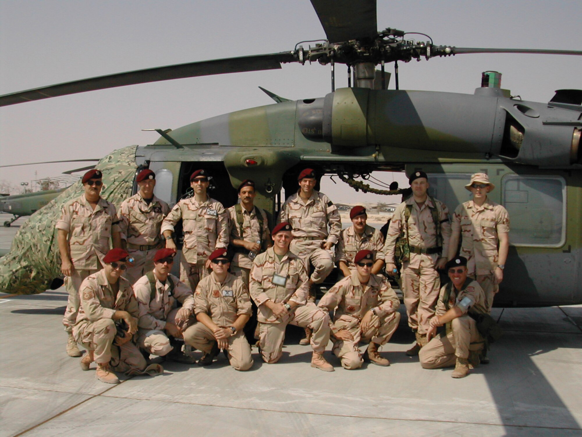 Then-Senior Master Sgt. Paul Koester (top left) poses with fellow pararescuemen and team mates at a deployment less than four weeks after the attack on the World Trade Center. Now-Chief Master Sgt. Paul Koester is currently the oldest Airman serving on active-duty. Koester is the Pararescue Functional Manager for the Battlefield Airmen Branch at Pacific Air Forces Headquarters here. Koester calls Colorado Springs, Colo., home. (Courtesy photo/Released)