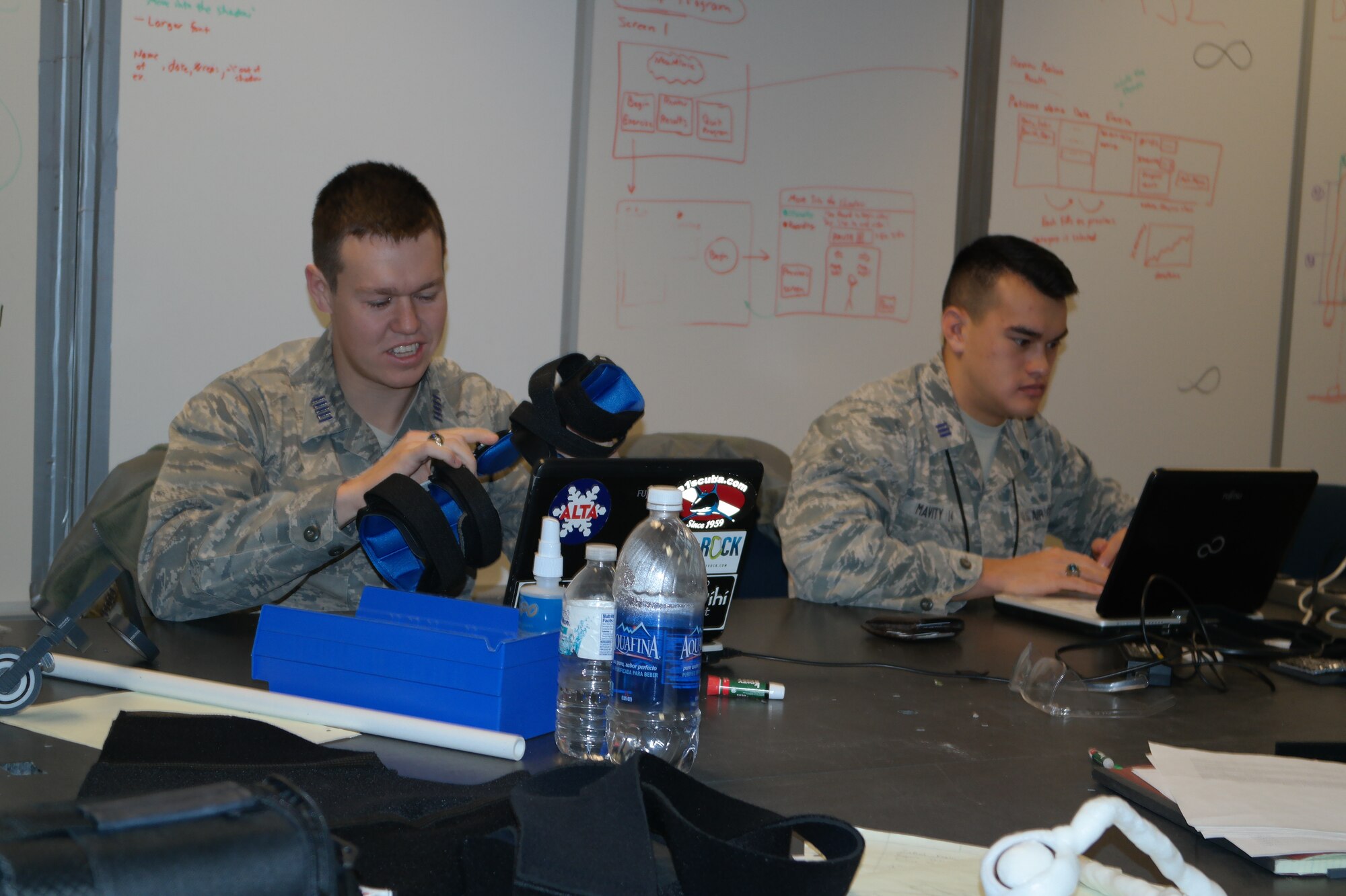 Cadets 1st Class Andrew Murrell and Ryan Mavity work to create the right type of brace to use with the Neumimic project, a FalconWorks project which has cadets partnering with Penrose-St. Francis Health Services experts to create a new way of helping patients recover from strokes. Dr. Glen House, who heads Penrose’s rehabilitation program, is working with the cadets to create the device, currently being used by the local hospital system.