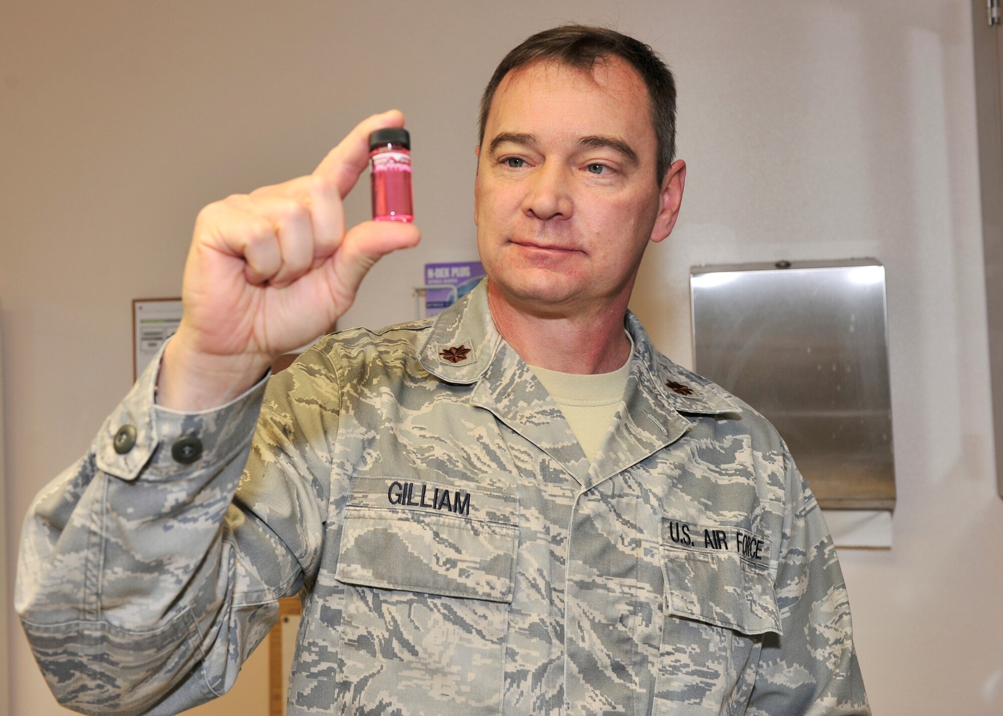 Maj. David Gilliam Jr., 354th Medical Operations Squadron bioenvironmental engineering flight commander, checks the chlorine level of a water sample Dec. 19, 2013, Eielson Air Force Base, Alaska. Gilliam recently received Pacific Air Force’s Biomedical Specialist Category I Field Grade Officer of the Year Award. (U.S. Air Force photo by Senior Airman Ashley Nicole Taylor/Released)