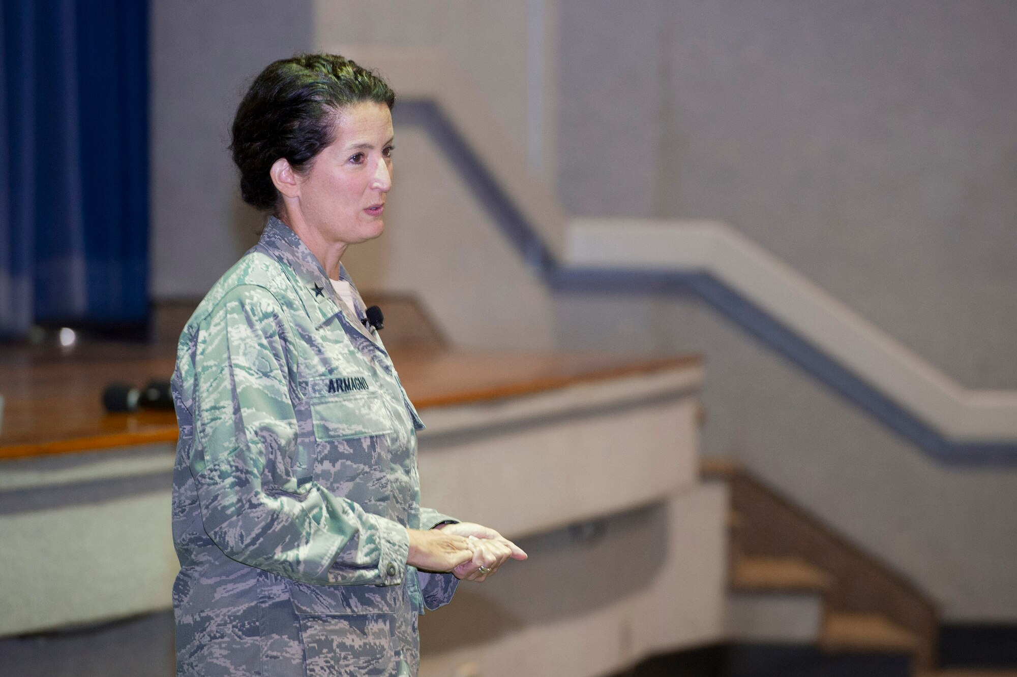 Brig. Gen. Nina Armagno, commander, 45th Space Wing, speaks during an Enlisted All Call Tuesday morning at the Base Theater. She conducted similar All Calls with the civilian workforce and offi cers separately in light of upcoming changes to the Fiscal Year 2014 Force Management programs. “Only you know what’s best for you and your family, not anyone else,” she said. “We just want you to use any and all the agencies we have at your disposable. We’re all in this together,” she said. (U.S. Air Force photo/Matthew Jurgens)