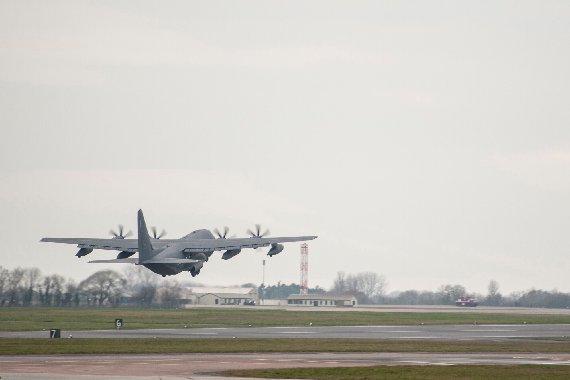 An MC-130J Commando II from the 67th Special Operations Squadron takes off during an exercise at RAF Fairford, England, Dec. 10, 2013. The exercise was designed to allow the 352nd Special Operations Group to practice and evaluate their ability to efficiently forward deploy the 352nd SOG’s newest assets, the CV-22 Osprey and MC-130J Commando II. The MC-130J flies low-visibility, single or multi-ship low-level air refueling missions for helicopters and tilt-rotor aircraft as well as resupply and transport of military forces via airdrop or airland. (U.S. Air Force photo by Staff Sgt. Stephen Linch/Released)