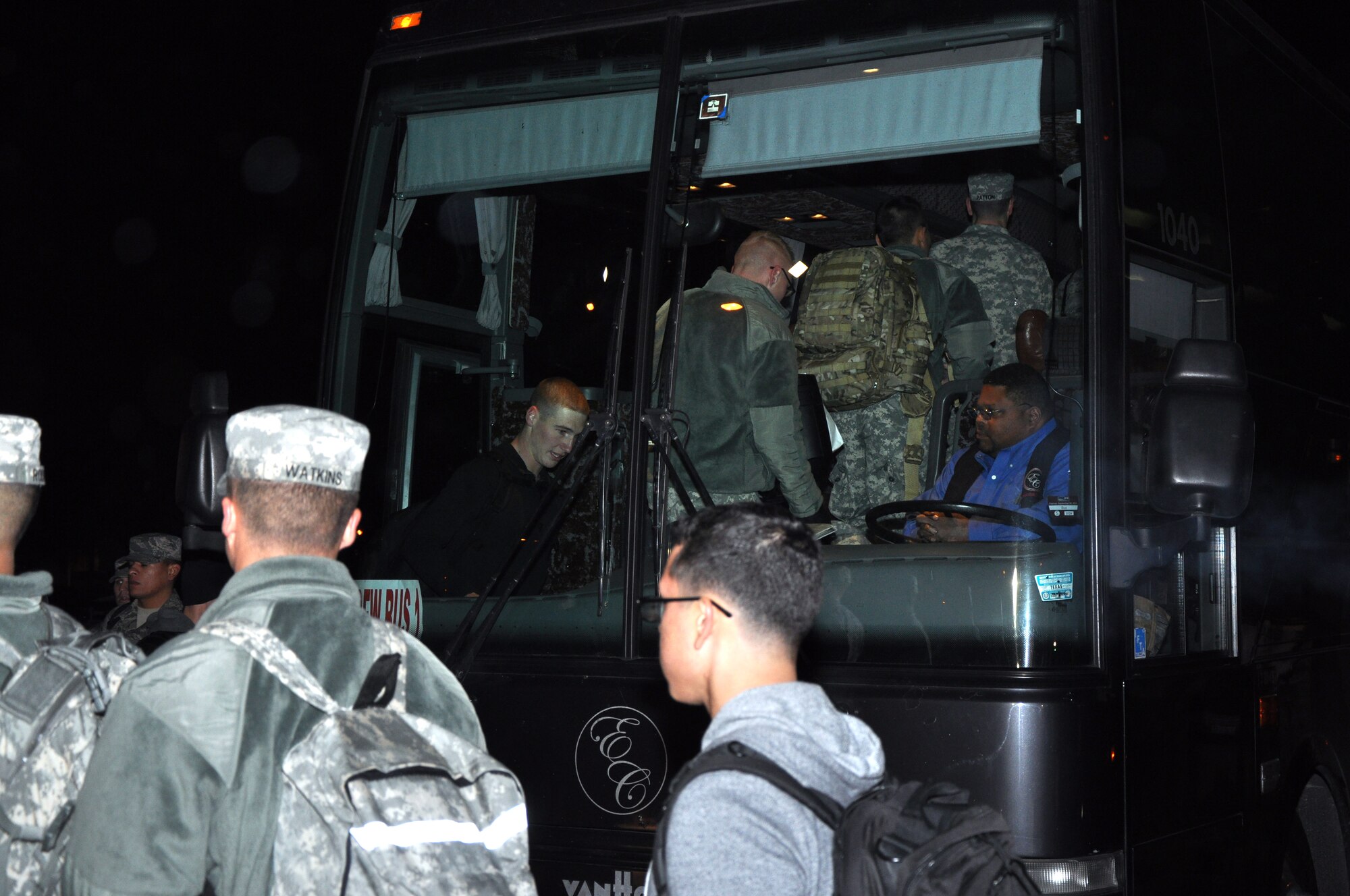 GOODFELLOW AIR FORCE BASE, Texas – Service members board a bus for exodus at the Carswell Field House parking lot Dec. 20. This bus and others left for Dallas-Fort Worth, San Antonio and Midland to transport students for the annual winter holiday. (U.S. Air Force photo/ Senior Airman Joshua Edwards)