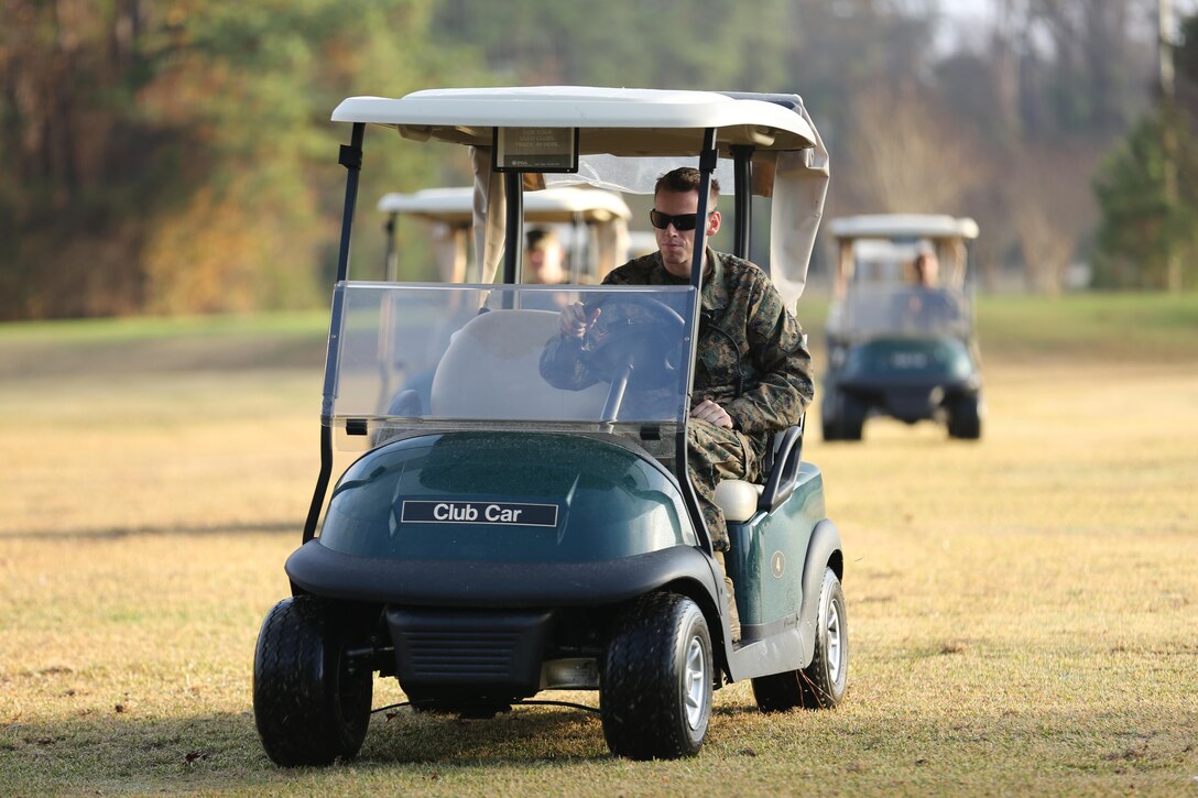 Tank commanders from 2nd Tank Battalion conducted tank maneuvers and tactics using golf carts at the Paradise Point Golf Complex, aboard Marine Corps Base Camp Lejeune, Dec. 10. If they had used actual tanks for the training, they would have needed eight square kilometers and 4,000 gallons of gas, according to 1st Lt. Graham Johnson, Charlie Company executive officer.