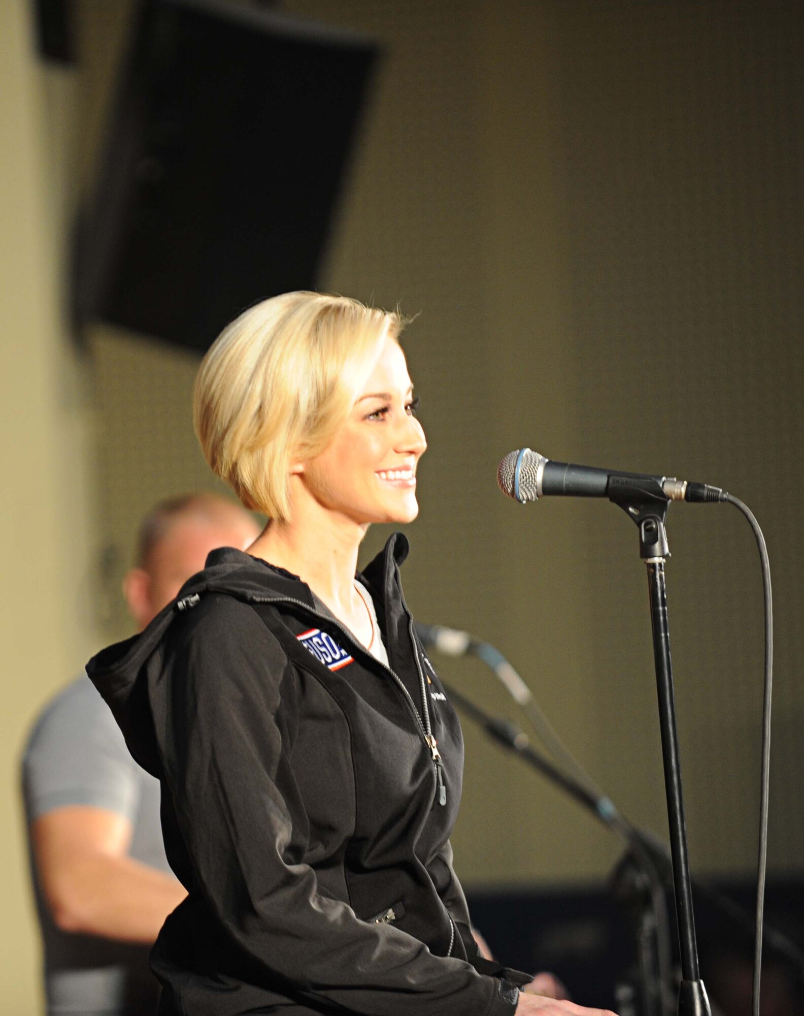 Country music singer Kelly Pickler performs during her seventh United Service Organization (USO) tour for 386th Air Expeditionary Wing personnel at an undisclosed location Southwest Asia. The new USO, “Every Moment Counts” campaign encourages all Americans to show troops their gratitude; Pickler’s contribution includes a nine-day tour around the area of responsibility. (U.S. Air Force photo by Senior Airman Desiree W. Moye)