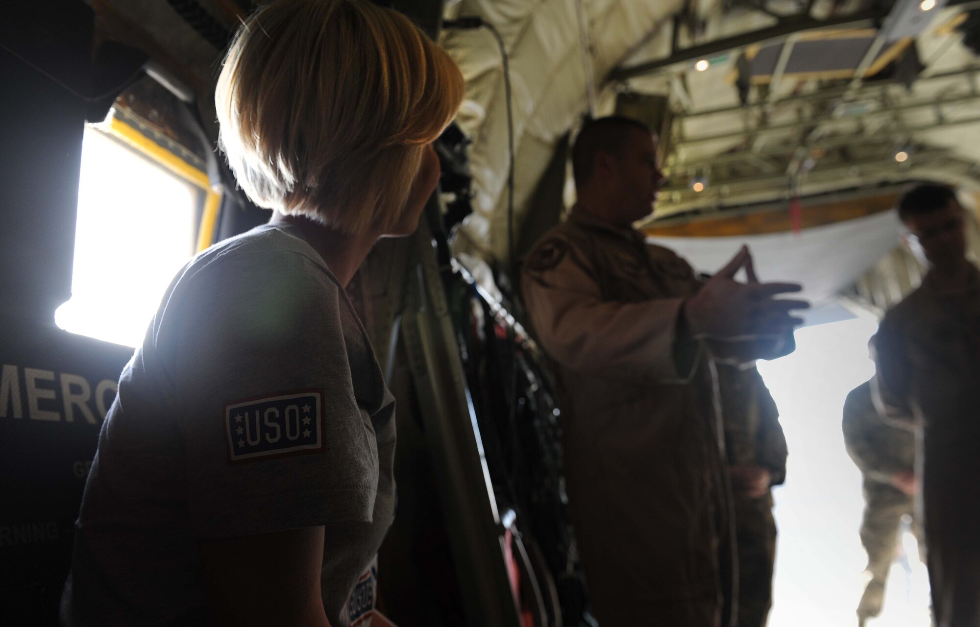 Country music singer Kellie Pickler visits 386th Air Expeditionary Wing personnel on a C-130J during her seventh United Service Organization (USO) tour at an undisclosed location Southwest Asia. The new USO, “Every Moment Counts” campaign encourages all Americans to show troops their gratitude; Pickler’s contribution includes a nine-day tour around the area of responsibility. (U.S. Air Force photo by Senior Airman Desiree W. Moye)
