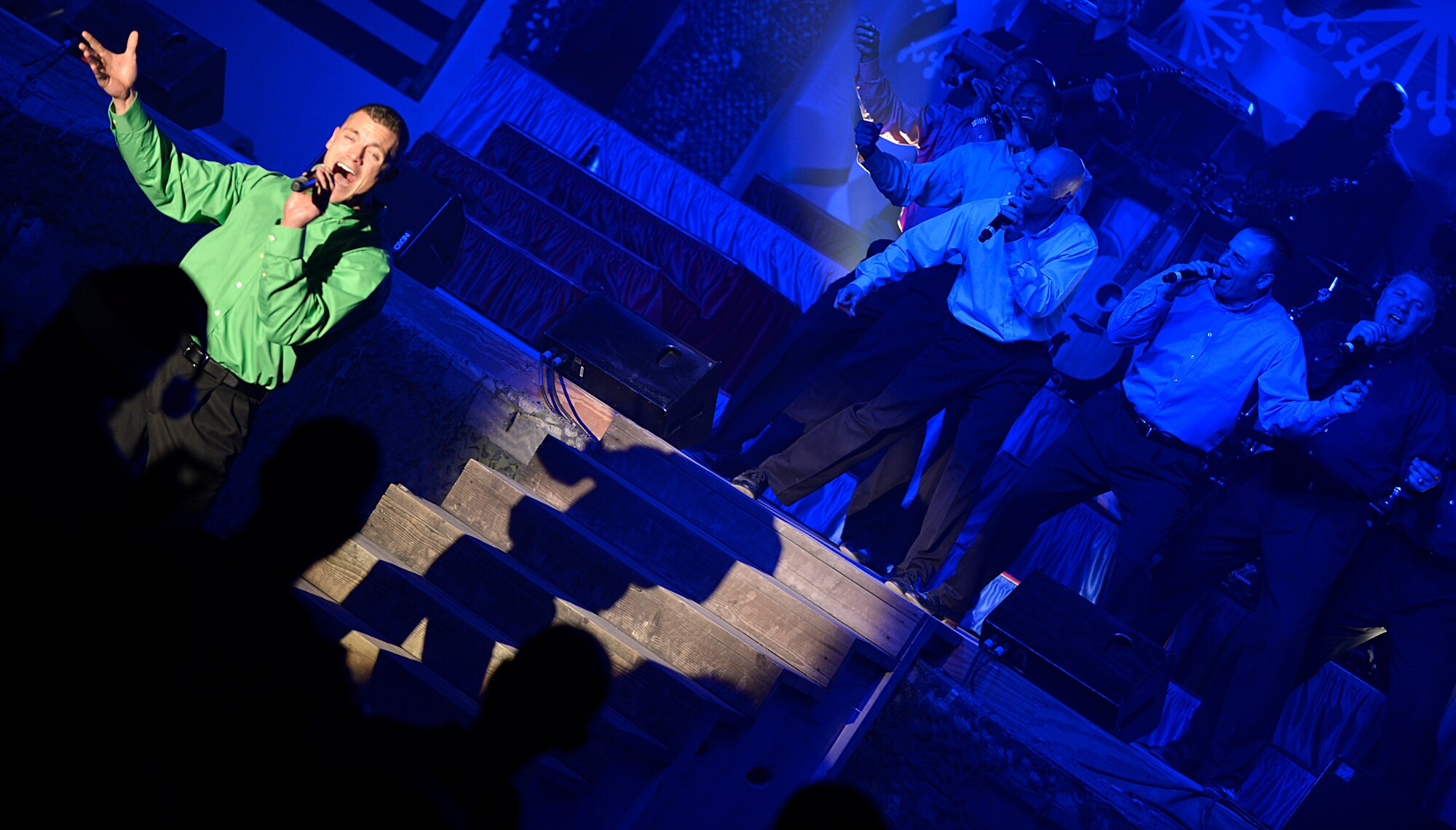 The Air Force Entertainment Group performs for deployed Service members at Bagram Airfield, Afghanistan, Dec. 24, 2013. The group is comprised of 27 prior Tops in Blue members, including Tech. Sgt. Angie Johnson, Jerome “JROME” Wayne and Tech. Sgt. Lane McCray. (U.S. Air Force photo by Senior Airman Kayla Newman/Released)