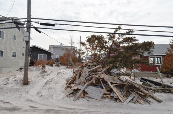 Debris left in Hurricane Sandy’s wake on Fire Island, N.Y., awaits removal Feb. 22, 2013. The U.S. Army Corps of Engineers is overseeing the removal of hurricane debris on Fire Island as part of the federal government’s Sandy response and recovery efforts in New York.