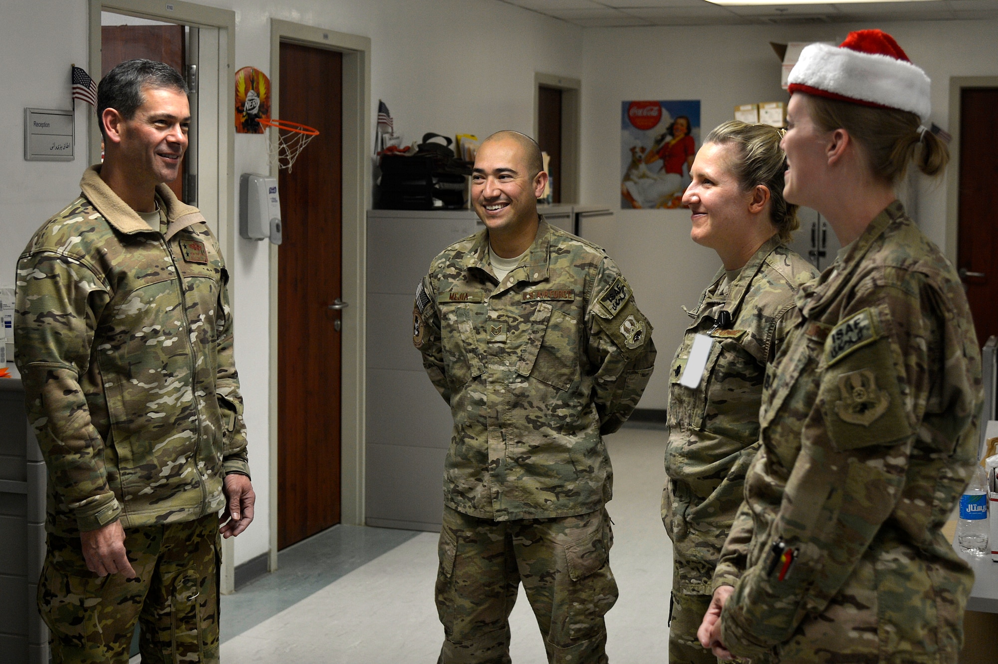 U.S. Air Force Maj. Gen. Kenneth Wilsbach, 9th Air and Space Expeditionary Task Force- Afghanistan; Deputy Commander -Air, U.S. Forces - Afghanistan; Deputy Chief of Staff - Air, International Security Assistance Force Joint Command, speaks with Service members assigned to Craig Joint Theater Hospital at Bagram Airfield, Afghanistan, Dec. 25, 2013. Along with the hospital, Wilsbach visited with Service members at an entry control point, the C-130 ramp, the F-16 Fighting Falcon hangar, the A-10 Thunderbolt II hangar and the HH-60G Pavehawk hangar. (U.S. Air Force photo by Senior Airman Kayla Newman/Released)