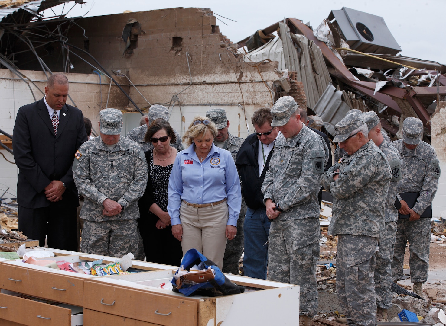 Among the National Guard responses in 2013 was the devastating tornado in Moore, Okla., on May 20. Mary Fallin, governor of Oklahoma, leads Gen. Frank J. Grass, chief, National Guard Bureau, through the Plaza Towers Elementary School in Moore, Okla., where seven students were killed.
