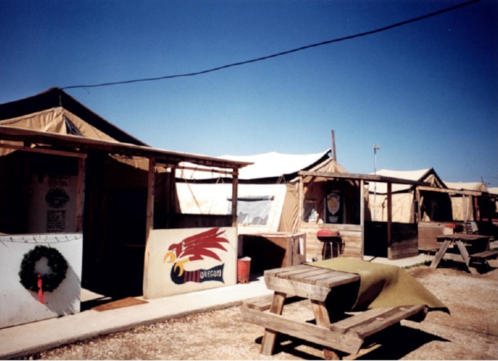 "Pride in the Oregon Air National Guard is shown as the famed 123rd Fighter Squadron Redhawk adorns the front of a porch on one of the tents in Incirlik's "Tent City" during the 142nd Fighter Wing operational deployment to Turkey. (Courtesy Senior Master Sgt. Ken Harris)