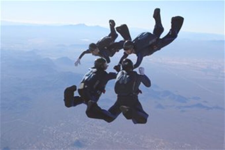 Cadets from the Air Force Academy's Wings of Blue parachute team will dive for another national championship Dec. 27-Jan. 2 at the 2013 National Collegiate Parachuting Championships In Lake Wales, Fla. 
