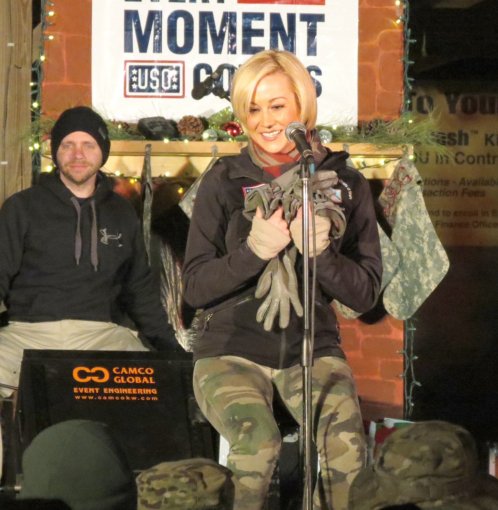Kellie Pickler performs for a Kandahar Airfield audience Dec. 25, 2013, at the Boardwalk on KAF, Afghanistan. Pickler was part of a holiday United Service Organizations Entertainment tour. Since 2007, she has participated in seven USO tours and 75 USO Entertainment events, according to the USO Web site. (U.S. Air Force photo by Senior Airman Alexandria Bandin)