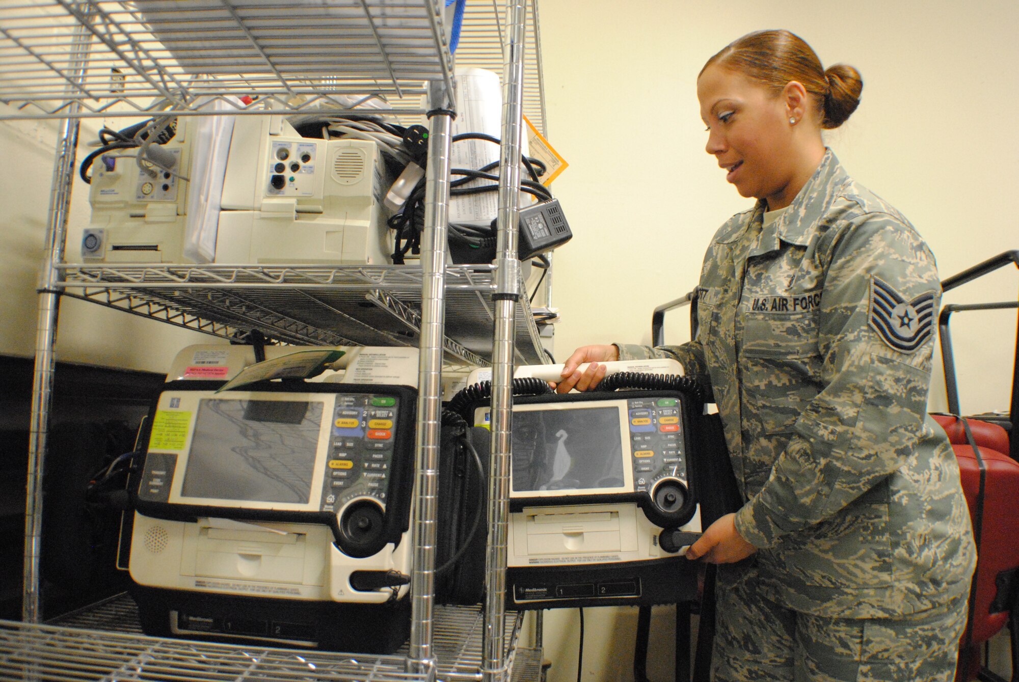 Tech. Sgt. Brandie M. Scott, medical logistics flight chief for the 319th Medical Support Squadron, places medical equipment onto shelves for future inspection at the 319th Medical Group’s medical logistics warehouse Dec. 27, 2013, on Grand Forks Air Force Base, N.D. Scott is the only enlisted medical logistics member for Grand Forks AFB, and provides medical logistics support to four geographically separated units, including the 934th Aeromedical Evacuation Squadron at Minneapolis-St. Paul Air Reserve Station and the 148th Fighter Wing at Duluth Air National Guard Base, Minn. (U.S. Air Force photo/Staff Sgt. Luis Loza Gutierrez)
