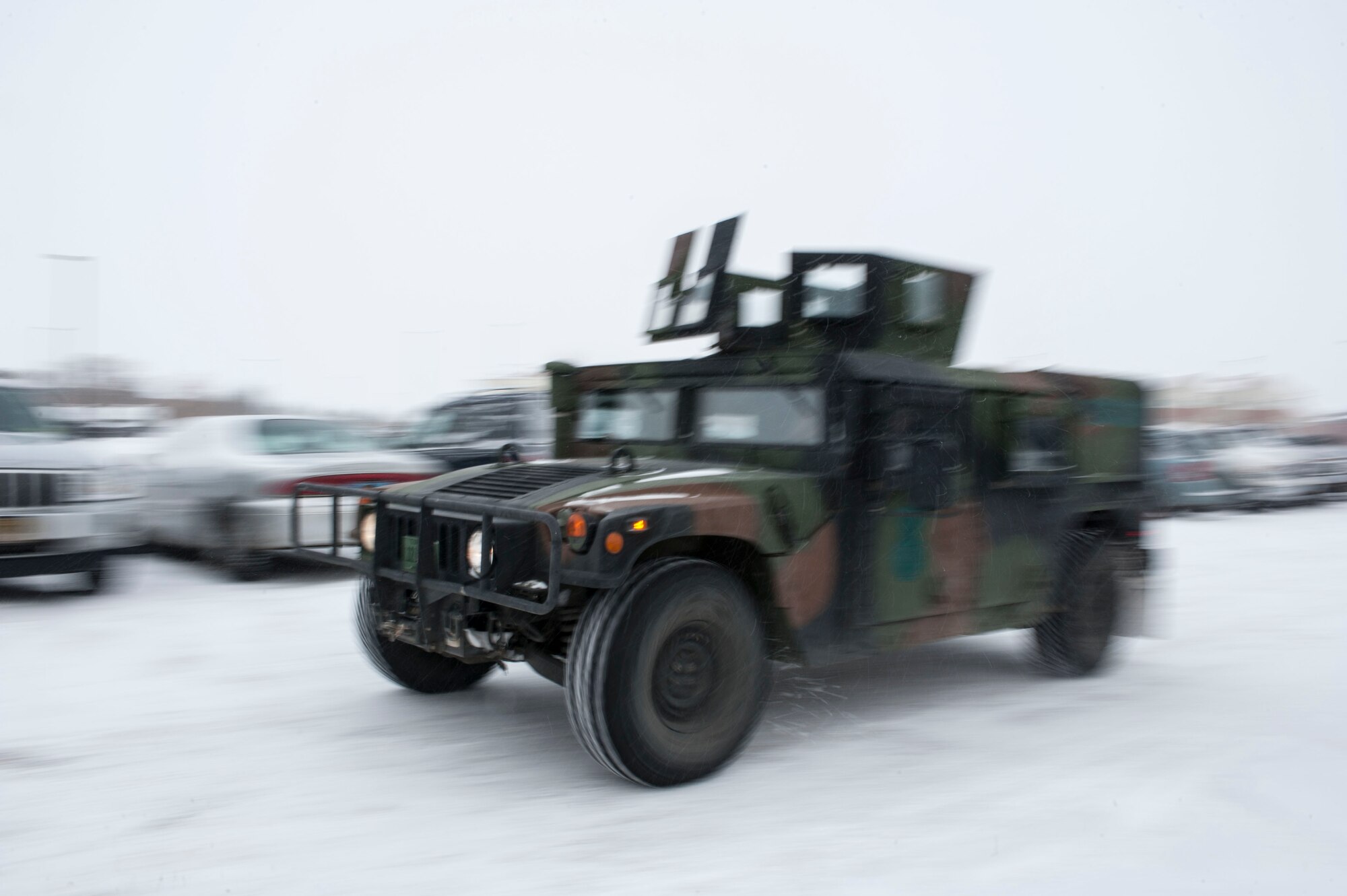 Airmen from the 91st Missile Security Forces Squadron, return from the missile field to Minot Air Force Base, N.D. Dec. 13, 2013. Members of the 91st MSFS operate on 12-hour shifts, and are on alert 24/7, 365 days a year, ready to deploy at a moment's notice to launch and missile alert facilities. (U.S. Air Force photo/Senior Airman Stephanie Sauberan)
