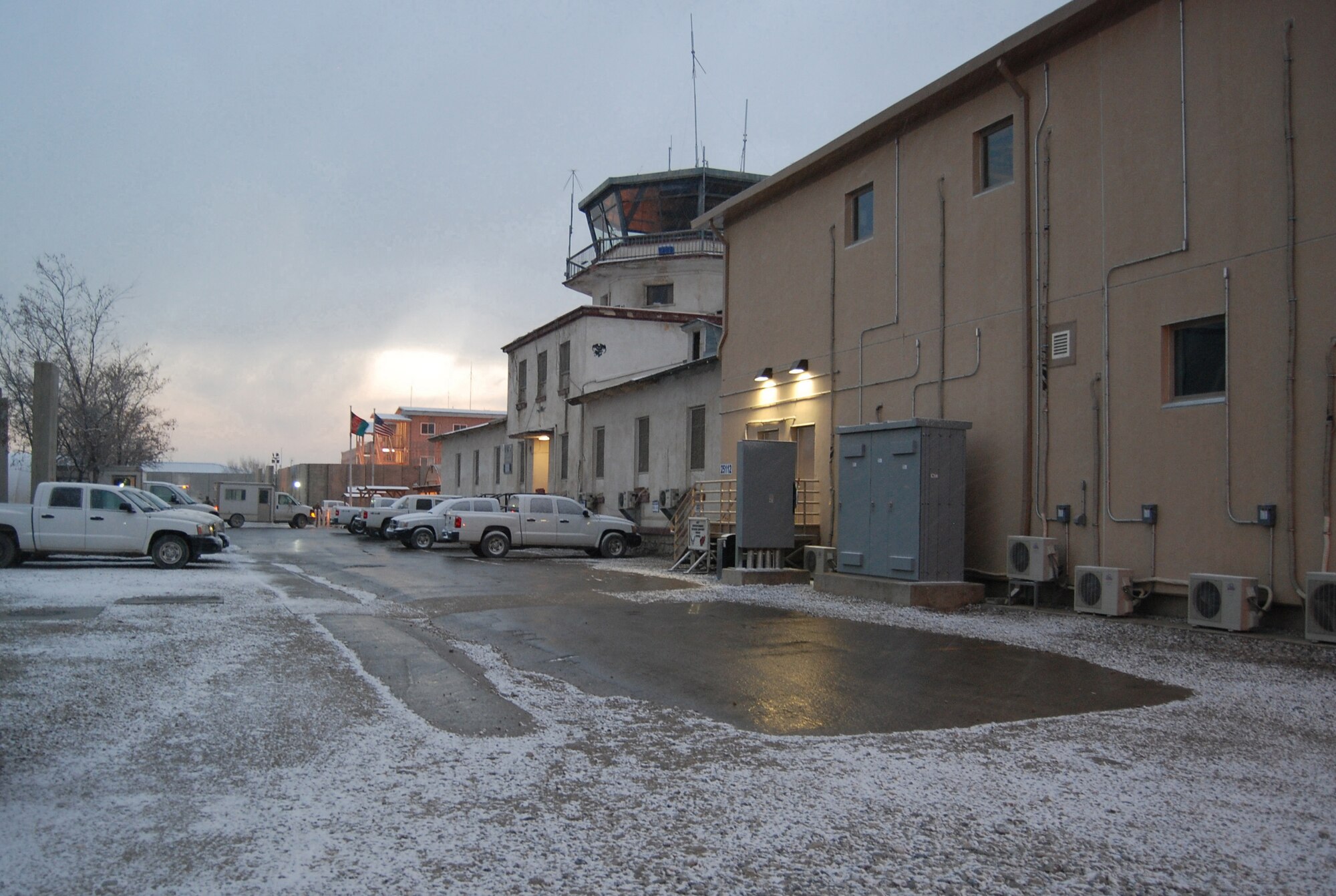 Camp Cunningham area is covered with a dusting of snow at Bagram Airfield, Afghanistan, Dec. 29, 2013. A light snow started in the afternoon and eventually resulted in three inches of snow. (U.S. Air Force photo by Capt. Brian Wagner)