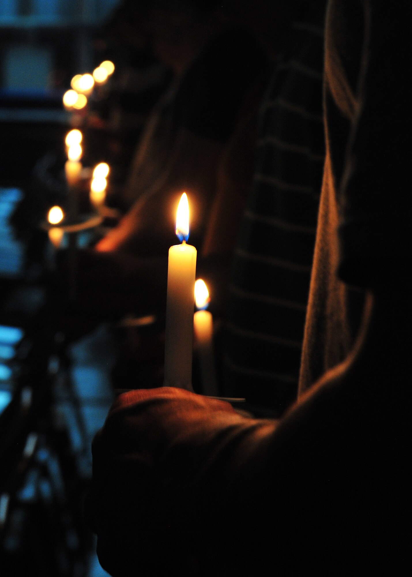 The Seven Sands Chapel held an ecumenical candlelight worship service at an undisclosed location in Southwest Asia, Dec. 22, 2013. Spiritual resilience includes but is not limited to worldviews, religious faith, sense of purpose, sense of connectedness, values, ethics and morals. (U.S. Air Force photo by Staff Sgt. Michael Means/Released)