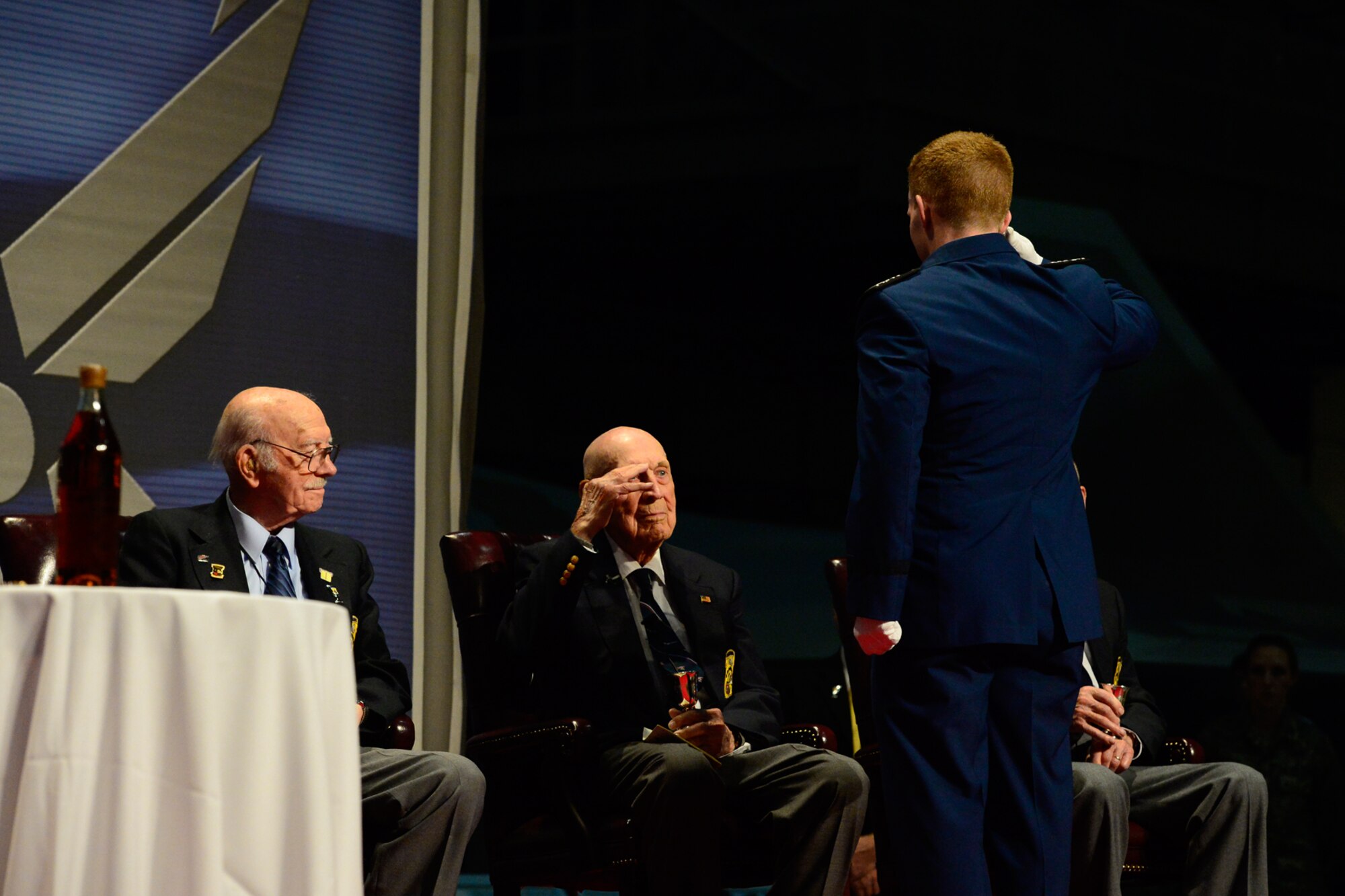 Air Force Academy cadets hand out a goblet to each Raider with their name on it during The Doolittle Raiders final toast at the National Museum of the U.S. Air Force Nov. 09, 2013 in Dayton, Ohio. (U.S. Air Force photo/Desiree N. Palacios)