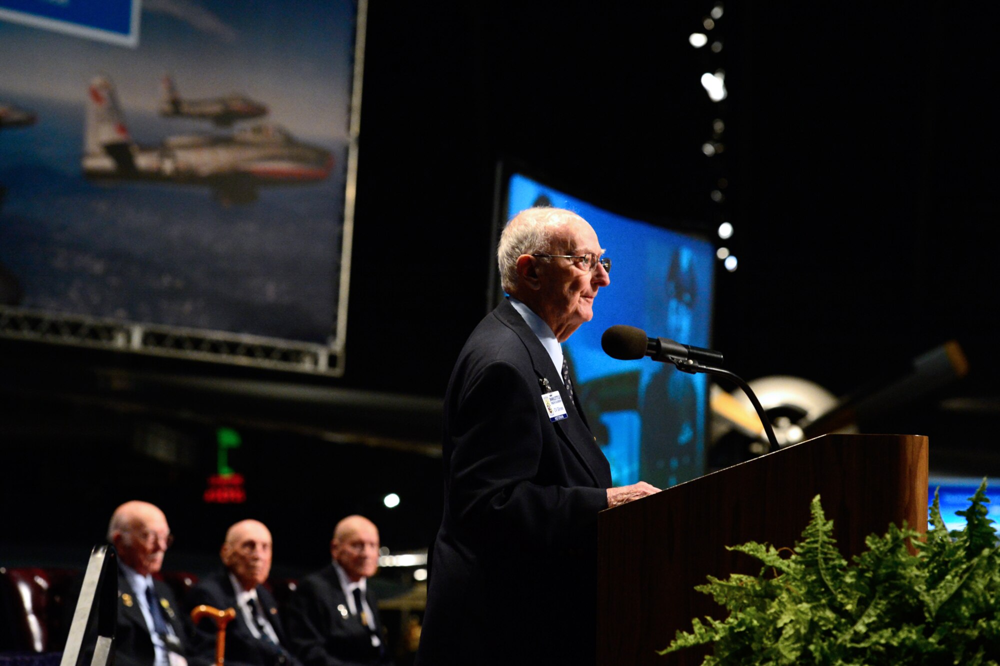 Retired Col. Carroll "C.V" Glines took the podium before The Doolittle Tokyo Raiders shared their last and final toast at the National Museum of the U.S. Air Force Nov. 09, 2013 in Dayton, Ohio. Glines is the historian for the Doolittle Raiders and a distinguished author. (U.S. Air Force photo/Desiree N. Palacios)