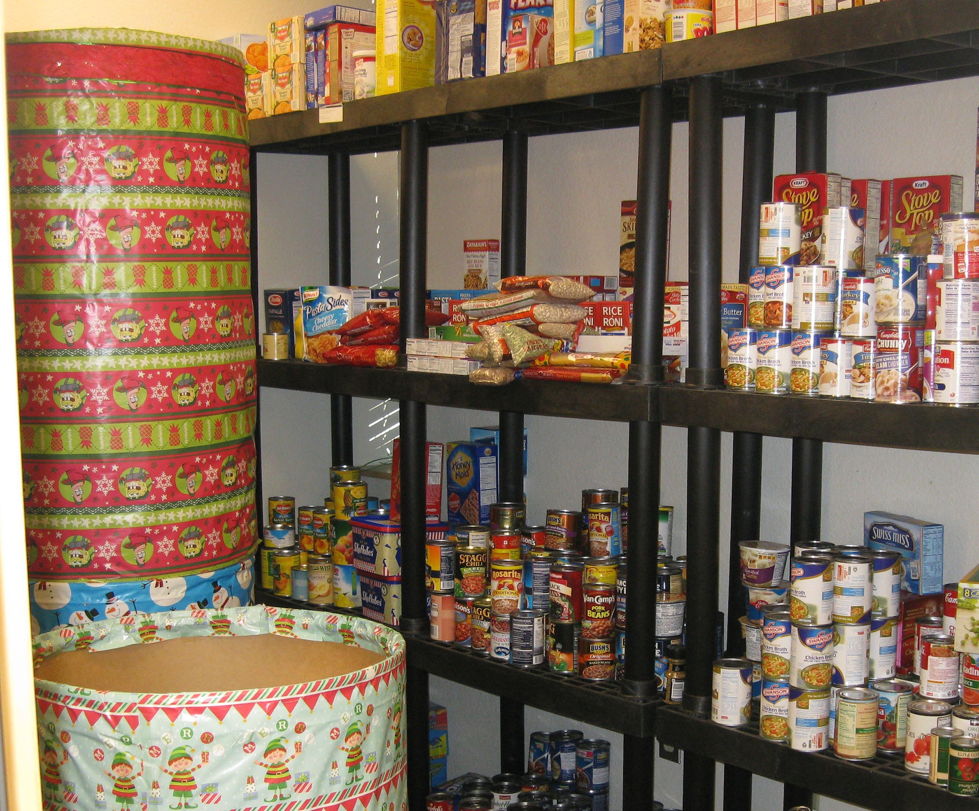 TRAVIS AIR FORCE BASE, Calif. -- The 349th Air Mobility Wing Chaplain's Annual Holiday Food Drive has wrapped-up for another holiday season with a food donation tally of more than 1300 pounds to help feed those in need in the local area. (U.S. Air Force photo/Patti Schwab-Holloway) 