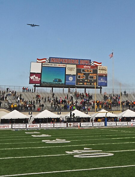 A B-25 Mitchell Special Delivery flies over the AdvoCare V100 Bowl game in Shreveport, La., Dec. 31, 2013. The flight was in honor of the Doolittle Raiders, who were named the 2013 recipients of the Omar N. Bradley Spirit of Independence Award. Special Delivery is the official B-25 of the Doolittle Raiders Association. The Doolittle Tokyo Raid was the first U.S. air retaliation attack for the attack on Pearl Harbor. (U.S. Air Force photo/ Senior Airman Kristin High)