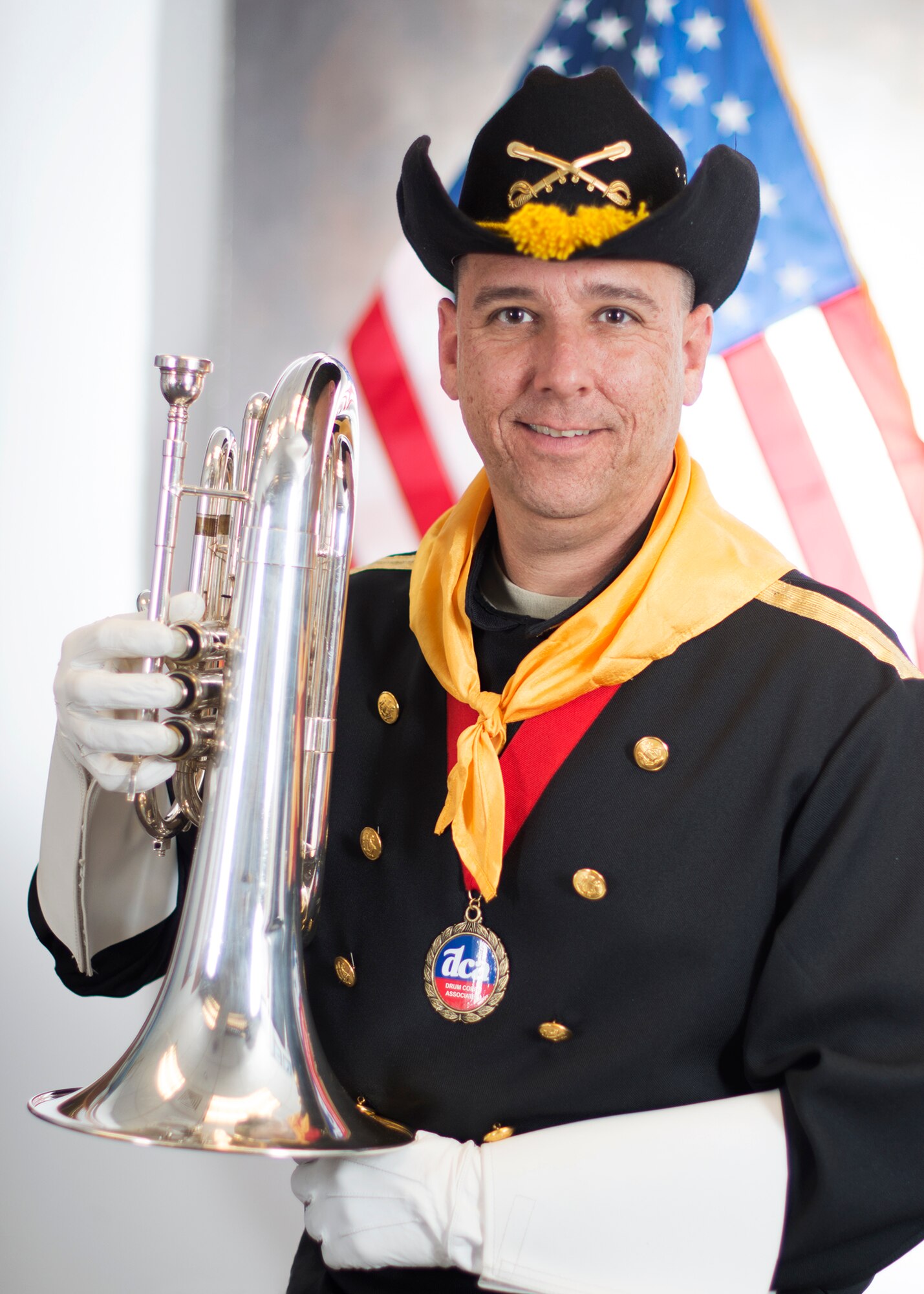 Senior Master Sgt. Michael Haag Operation's Manager for the 914th Civil Engineer Squadron at Niagara Falls Air Reserve Station poses in his Ghost Rider's Drum and Bugle Corps uniform, December 4 2013, Niagara Falls, N.Y. Haag's involvement in the Drum Corps began over twenty-five years ago, beginning with the Buccaneers of Reading, PA, then moving on to the Blessed Sacrament Golden Knights of NJ, Mighty St. Joe's of Le Roy, N.Y., the Rochester Crusaders, and lastly, the Ghost Riders of Batavia, N.Y. (U.S. Air Force photo by Staff Sgt. Stephanie Clark)