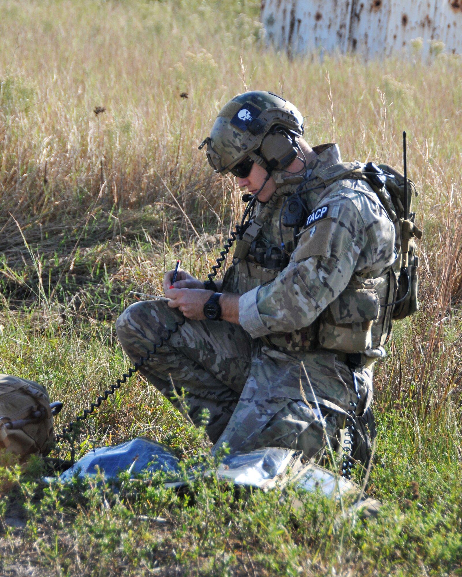 A member from the 147th Reconnaissance Wing Air Support Operations Squadron trains at Avon Park Air Force Range, Florida to complete required periodic evaluations December 16, 2013. Performing exercises at the Florida range allows the airmen to hone the necessary skill sets to perform their jobs and missions in an environment that allows for the use of live fighter aircraft and live munitions to replicate real-life war fighting scenarios.