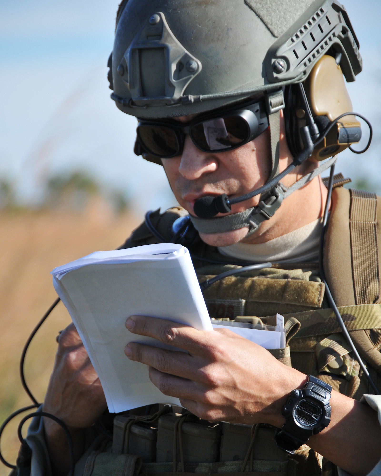 A member from the 147th Reconnaissance Wing Air Support Operations Squadron trains at Avon Park Air Force Range, Florida to complete required periodic evaluations December 16, 2013. Performing exercises at the Florida range allows the airmen to hone the necessary skill sets to perform their jobs and missions in an environment that allows for the use of live fighter aircraft and live munitions to replicate real-life war fighting scenarios.