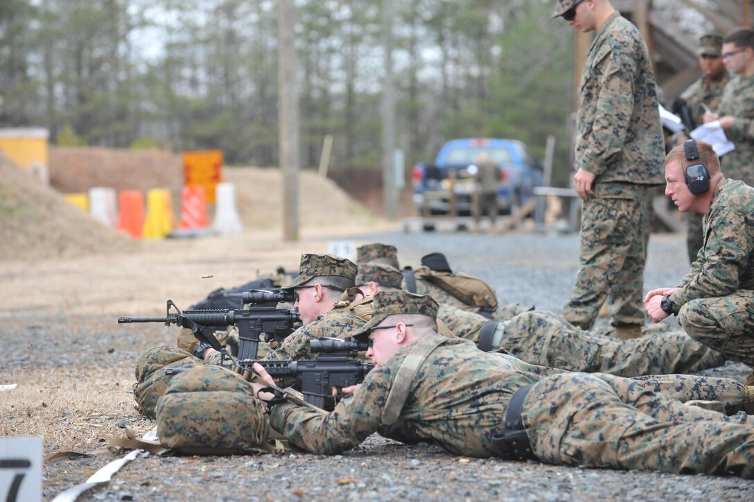 Guard Co. Marines fire M4 carbines during a training exercise on the High Risk Personnel Course at Weapons Training Battalion on Jan. 30. The Marines also used pistols and shotguns during the exercise. 