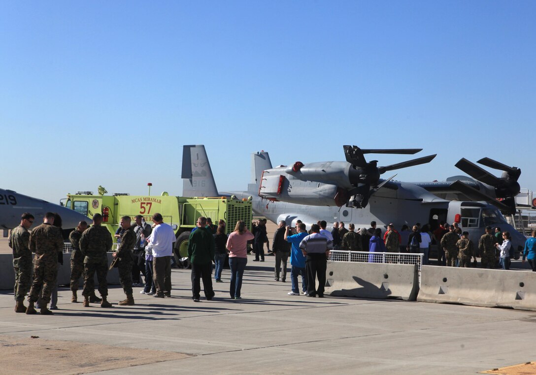 Educators tour the flight line during an Educators Workshop aboard Marine Corps Air Station Miramar, Calif., Jan. 30. Educators received the chance to go inside the diverse aircraft on Miramar.  