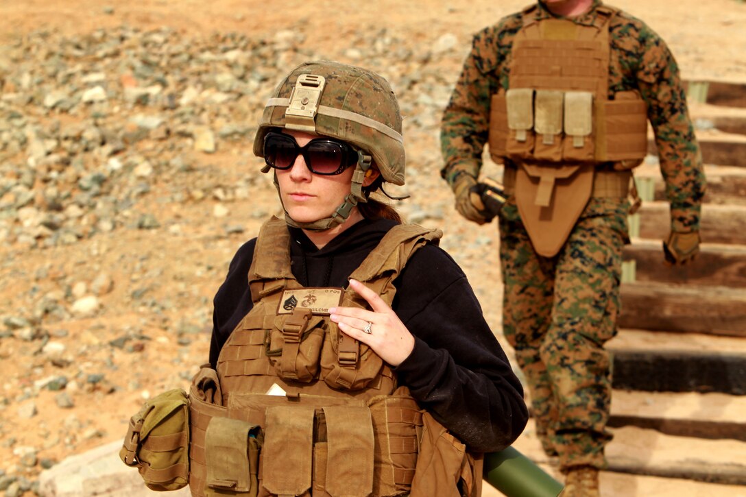 Affton Gilcrest, wife of Staff Sgt. James Gilcrest, platoon sergeant, Company I, 3rd Battlaion, 7th Marine Regiment, walks back from the firing line at the Combat Center’s Range 106 Jan. 24, 2013. 