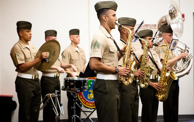 The U.S. Marine Corps Forces, Pacific Band plays music before the awards and promotions formation here Feb. 1. MarForPac also held a streamer ceremony for their recently-awarded Meritorious Unit Commendation at the formation.