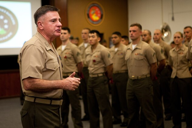 Lt. Gen Terry G. Robling, commander of U.S. Marine Corps Forces, Pacific, addresses Marines under his command after a streamer ceremony for their recently-awarded Meritorious Unit Commendation here Feb. 1. MarForPac was awarded the MUC for spearheading the Corps’ rebalance toward Asia-Pacific from Sep. 1, 2010 to Aug. 31, 2012. “I’m proud of all of you,” Robling said. “You’ve received this MUC for all the work that you’ve done the last two years.”