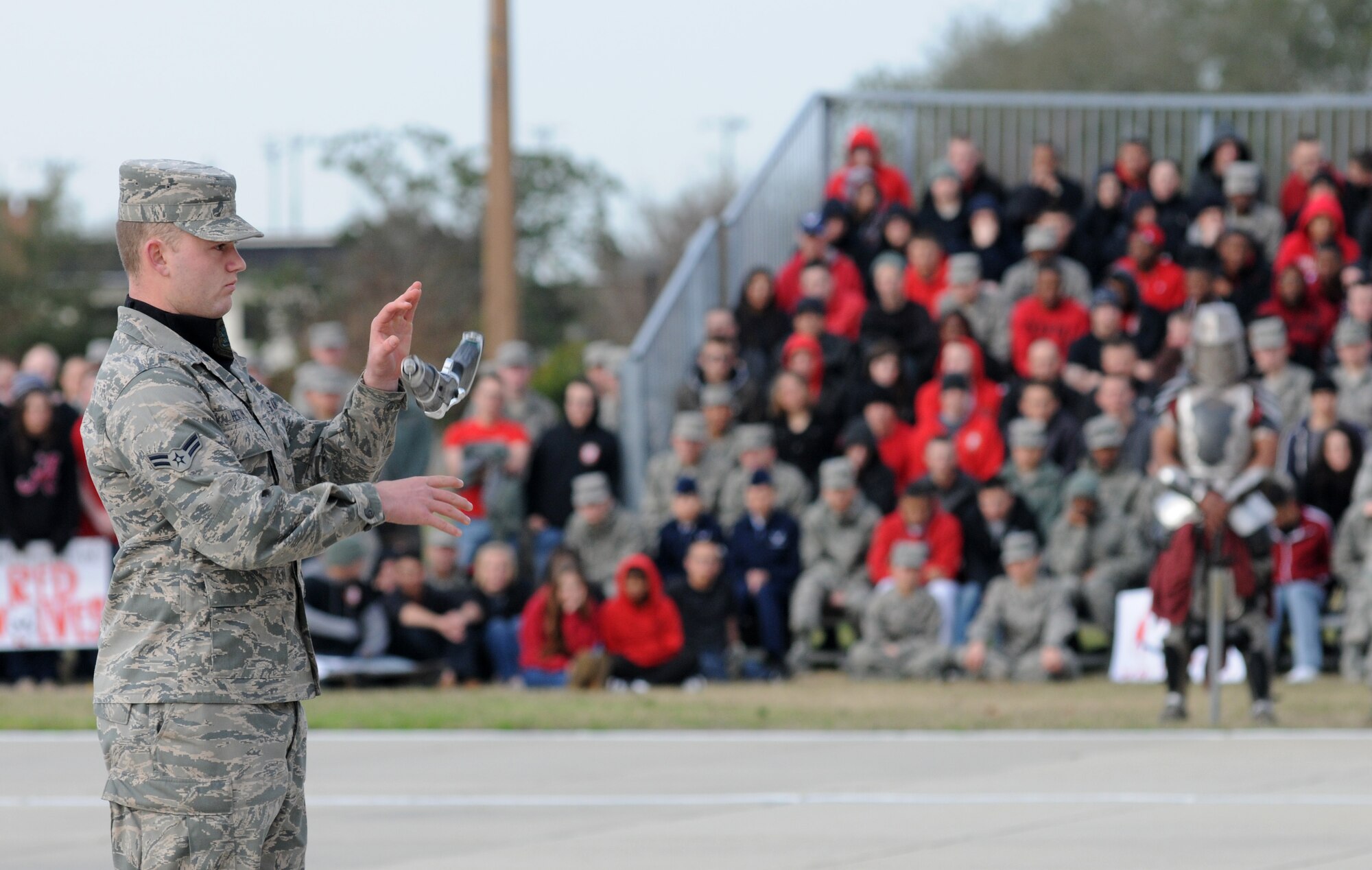 Airman 1st Class Ryan Heaton, 334th Training Squadron, spins his weapon during the freestyle drill competition at the first drill down of the season Feb. 1, 2013, at the Levitow Training Support Facility, Keesler Air Force Base, Miss.  The 338th TRS was the overall winner of the drill down, with the 335th TRS taking second and the 336th TRS in third.  (U.S. Air Force photo by Kemberly Groue)
