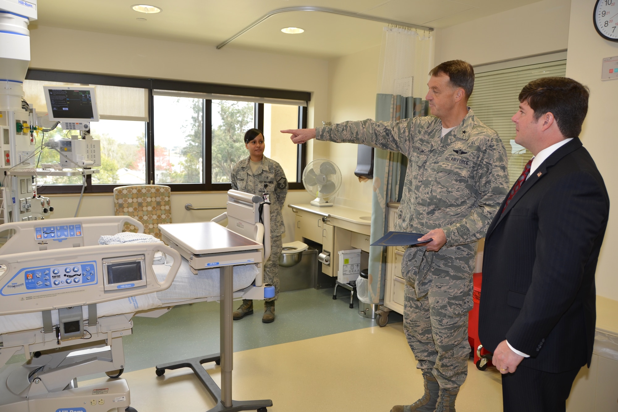 Brig. Gen. (Dr.) Kory Cornum, 81st Medical Group commander, left, points out features of an intensive care unit patient room to Mississippi’s Fourth District Congressman Steven Palazzo as he tours the Keesler Medical Center’s new Back Bay Tower Feb. 1, 2013, at Keesler Air Force Base, Miss.  The congressman was the guest speaker at the ribbon-cutting ceremony marking the official opening of the tower. It contains state-of-the art medical and surgical inpatient wards, intensive care and recovery/peri-anesthesia care units as well as a new emergency department, physical-occupational therapy-chiropractic clinic, two new operating rooms and two cardiac catheterization labs.  The hospital started using the new facility in December.  Cornum also used the opportunity to announce the Keesler Hospital has been officially re-designated “Keesler Medical Center.”   (U.S. Air Force photo by Steve Pivnick)
