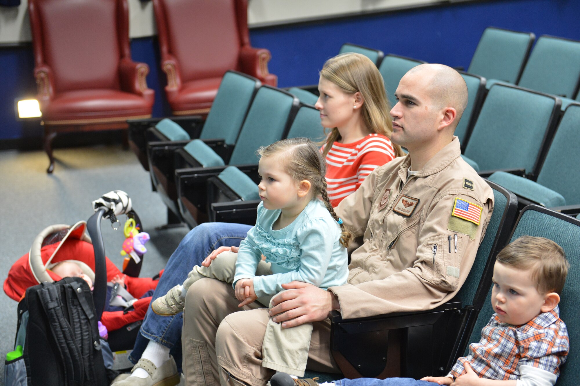 Capt. Chad Bridgeford, 8th Airlift Squadron pilot, spends time with his family before leaving for a 60-day deployment to Southwest Asia, Jan. 31, 2013, at Joint Base Lewis-McChord, Wash. The 8th AS, along with members of the 446th Airlift Wing, will be deployed to provide global strategic airlift, airdrop, aeromedical evacuation and humanitarian relief, to create an air bridge for personnel, equipment and supplies throughout Southwest Asia. (U.S. Air Force photo/Staff Sgt. Jason Truskowski)