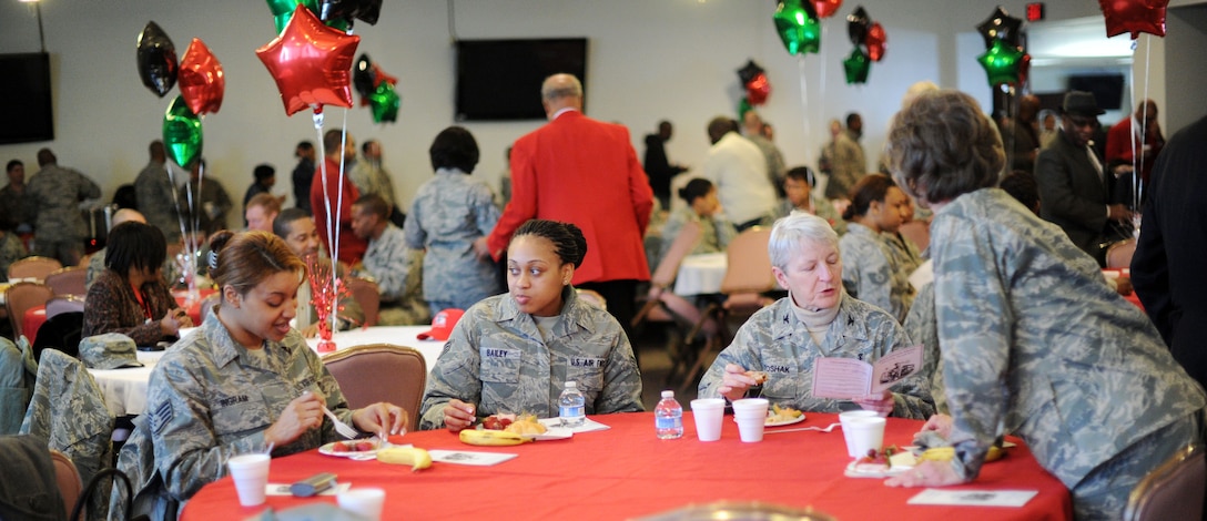 Team Andrews' members socialize during the Black History Month Opening Breakfast at Joint Base Andrews, Md., Feb. 1, 2013. The event, hosted by the 459th Air Refueling Wing, featured guest speaker Dr. Roscoe C. Brown Jr., who was a former Tuskegee Airman. (U.S. Air Force photo/ Staff Sgt. Nichelle Anderson) 