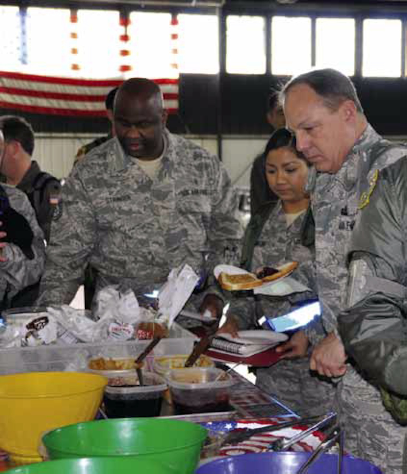Wing members are treated to some snacks after completing their deployment processing for the Operational Readiness Inspection. (U.S. Air Force photo by Master Sgt. Linda Welz)