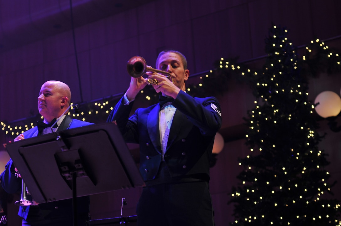 Staff Sergeant Carl Eitzen performs on the trumpet with Heartland Brass and Offutt Brass in "Overture Battle Royal from 'The Nutcracker'"