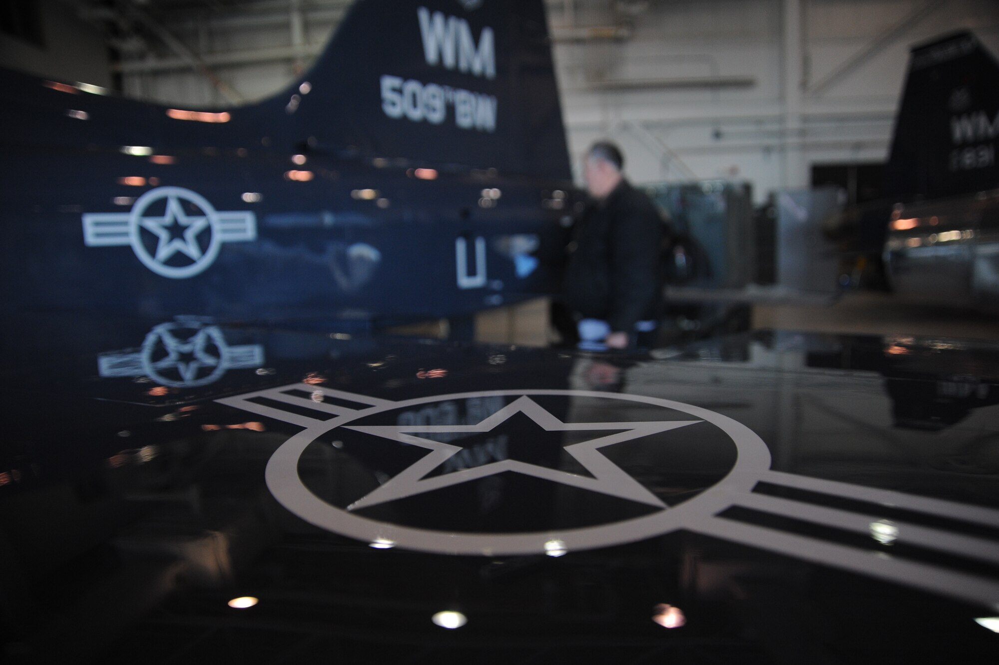 WHITEMAN AIR FORCE BASE, Mo. -- Russ Cass, M1 Support services aircraft mechanic, checks the oil of a T-38 Talon, Jan. 23. Checking oil is one of many inspection items that must be performed with each post-flight inspection. (U.S. Air Force photo/Staff Sgt. Nick Wilson) (Released)