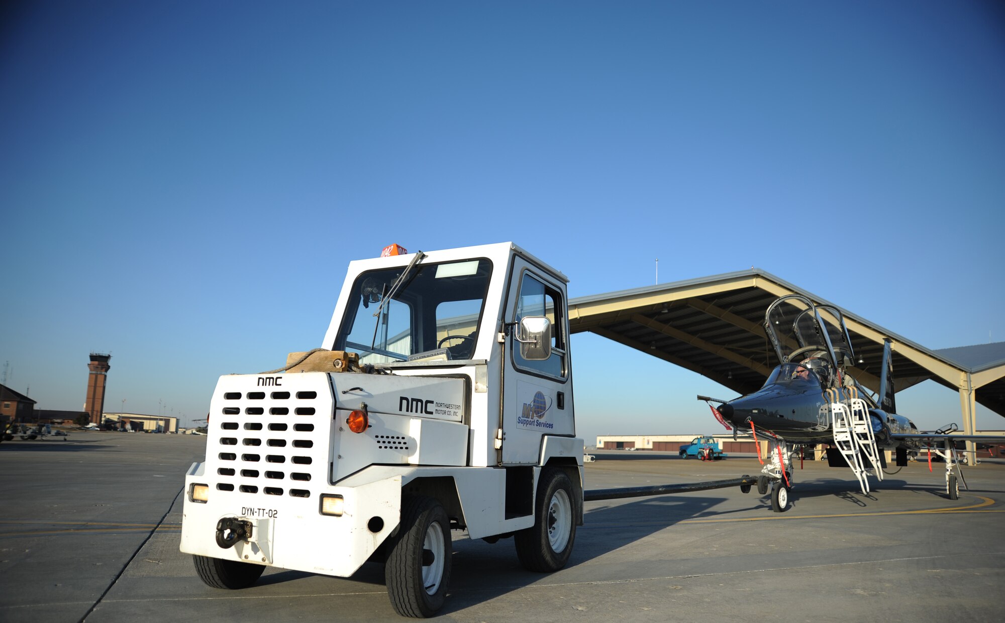 WHITEMAN AIR FORCE BASE, Mo. -- A Warehouse tug is used to tow a T-38 Talon after flight, Jan. 23. Warehouse tugs are used to tow aircraft that are 15, 000 pounds or less. (U.S. Air Force photo/Staff Sgt. Nick Wilson)(Released)