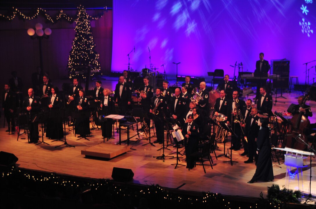 The Concert Band stands to be recognized at "A Hometown Holiday"