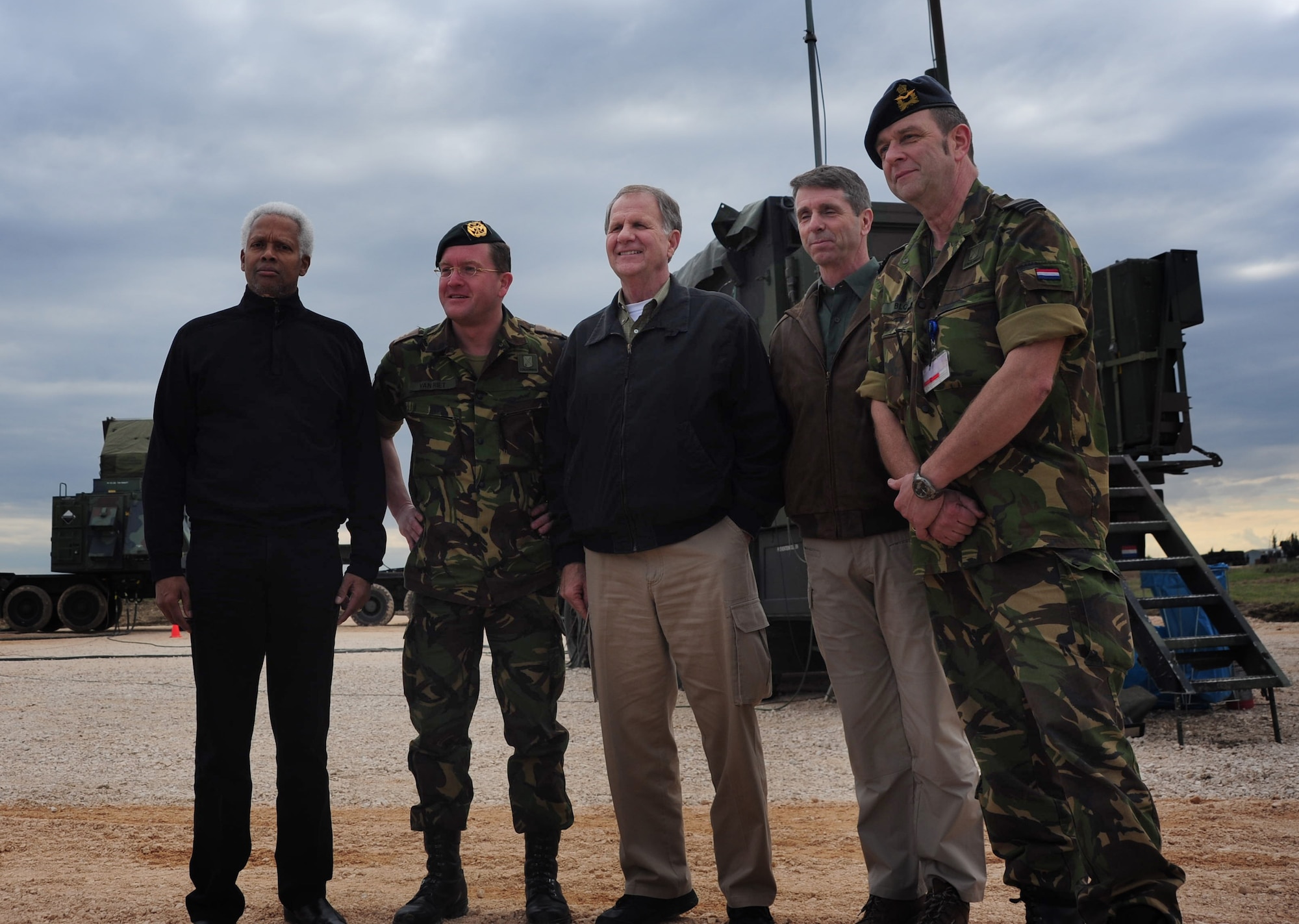 U.S. Reps. Hank Johnson of Georgia, Ted Poe of Texas and Rob Wittman of Virginia, get a picture with Dutch army soldiers Jan. 30, 2013, at Incirlik Air Base, Turkey. The three congressional delegates visited Incirlik to view the Patriot missile sites and met with NATO service members supporting the mission. (U.S. Air Force photo by Senior Airman Anthony Sanchelli/Released)