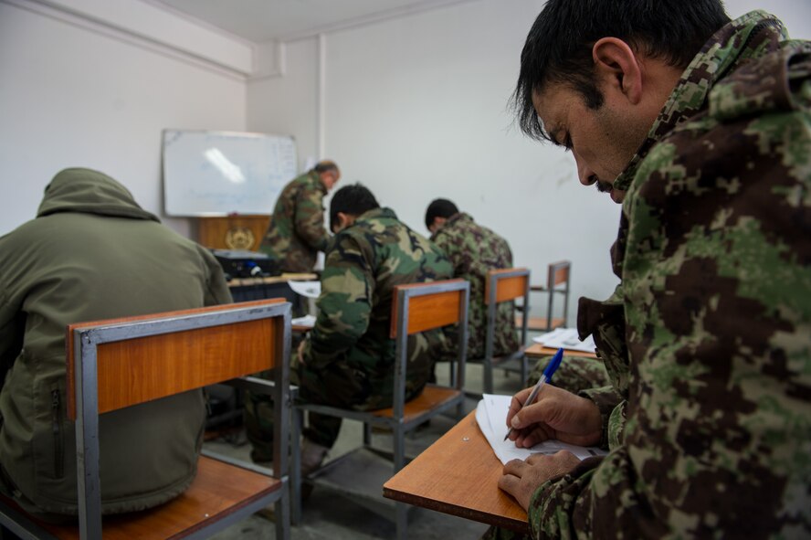 Afghan Air Force Airmen take notes during a class at Pohantoon-e-Hawayee, the AAF's “Big Air School,” in Kabul, Afghanistan, Jan. 12, 2013. PeH trains and educates the AAF's future technicians, maintainers and other specialists. (U.S. Air Force photo/Staff Sgt. Jonathan Snyder)