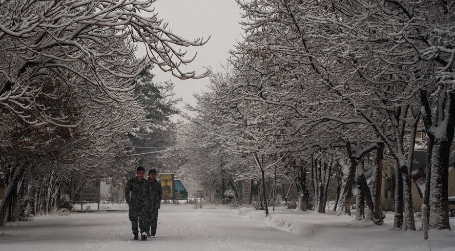 Afghan Air Force Airmen walk to class at Pohantoon-e-Hawayee, the AAF's “Big Air School,” in Kabul, Afghanistan, Jan. 12, 2013. PeH trains and educates the AAF's future technicians, maintainers and other career specialists. (U.S. Air Force photo/Staff Sgt. Jonathan Snyder)